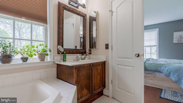 11400 Rolling Green Pl, Hagerstown, MD 21742 - ensuite bathroom featuring a tub, vanity, ensuite bath, and a healthy amount of sunlight
