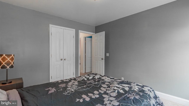 11400 Rolling Green Pl, Hagerstown, MD 21742 - carpeted bedroom featuring a closet and baseboards