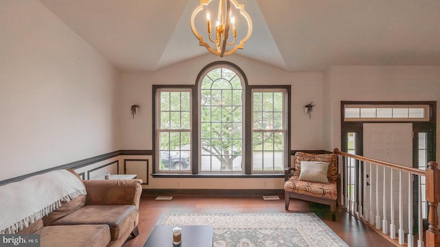 11400 Rolling Green Pl, Hagerstown, MD 21742 - sitting room featuring an inviting chandelier, lofted ceiling, visible vents, and wood finished floors