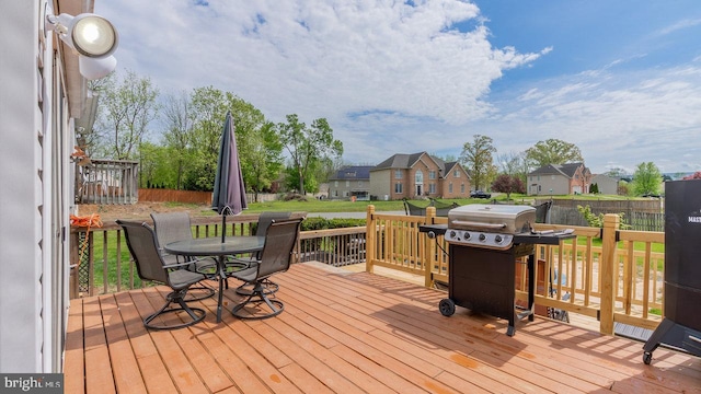 11400 Rolling Green Pl, Hagerstown, MD 21742 - deck featuring a yard, outdoor dining space, fence, a grill, and a residential view