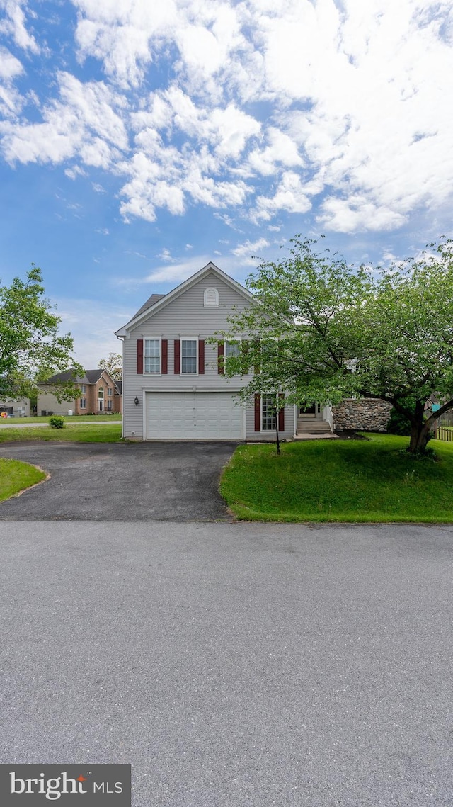 11400 Rolling Green Pl, Hagerstown, MD 21742 - view of front of home with aphalt driveway, a garage, and a front lawn