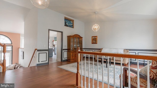 11400 Rolling Green Pl, Hagerstown, MD 21742 - dining area featuring vaulted ceiling, a chandelier, and wood finished floors