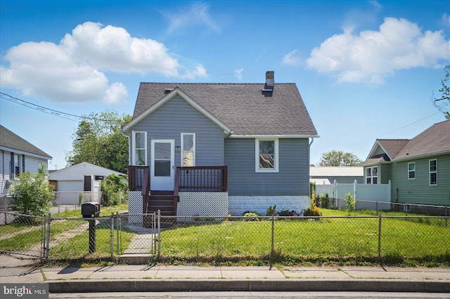 bungalow-style house featuring a front lawn, a chimney, a gate, a shingled roof, and a fenced front yard