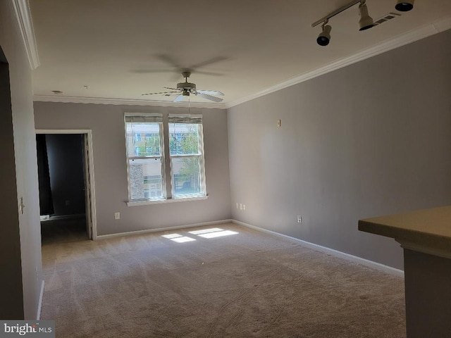 12001 Market St Unit 159, Reston, VA 20190 - empty room with a ceiling fan, baseboards, ornamental molding, carpet flooring, and rail lighting