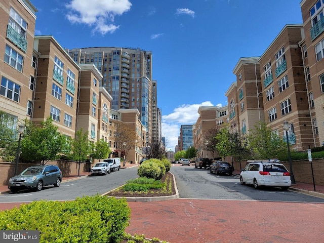 12001 Market St Unit 159, Reston, VA 20190 - view of street with street lights, curbs, and a view of city