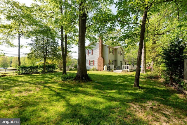 view of yard featuring fence