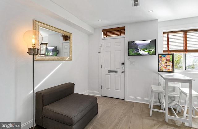 entryway featuring visible vents, recessed lighting, and baseboards