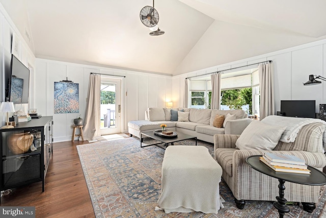 106 Boundary, Saint Michaels, MD 21663 - living room featuring a decorative wall, dark wood-style floors, and high vaulted ceiling