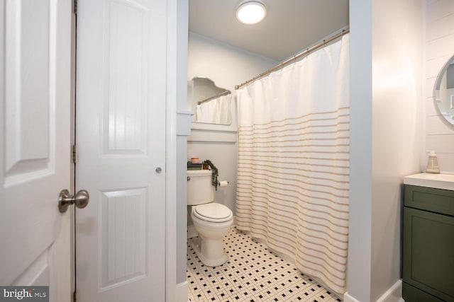 106 Boundary, Saint Michaels, MD 21663 - bathroom featuring vanity, tile patterned flooring, a shower with curtain, and toilet