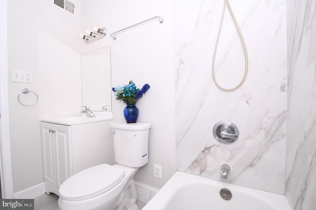 bathroom featuring visible vents, vanity, tub / shower combination, toilet, and baseboards