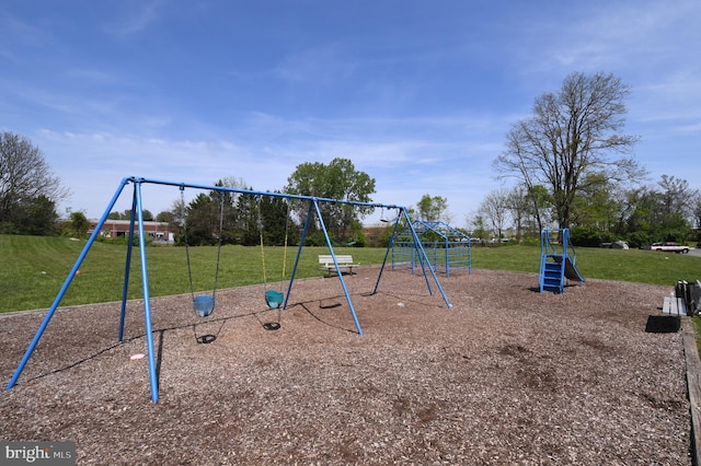 communal playground with a lawn