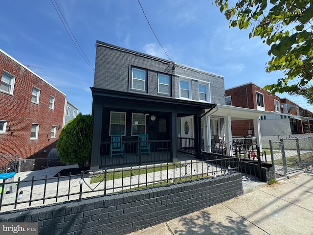 5371 Chillum Pl NE, Washington, DC 20011 - view of front of house featuring a porch and a fenced front yard
