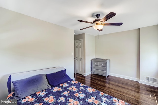 5371 Chillum Pl NE, Washington, DC 20011 - bedroom with wood finished floors, baseboards, and ceiling fan