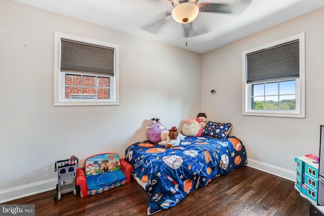 5371 Chillum Pl NE, Washington, DC 20011 - bedroom featuring wood finished floors, baseboards, and a ceiling fan