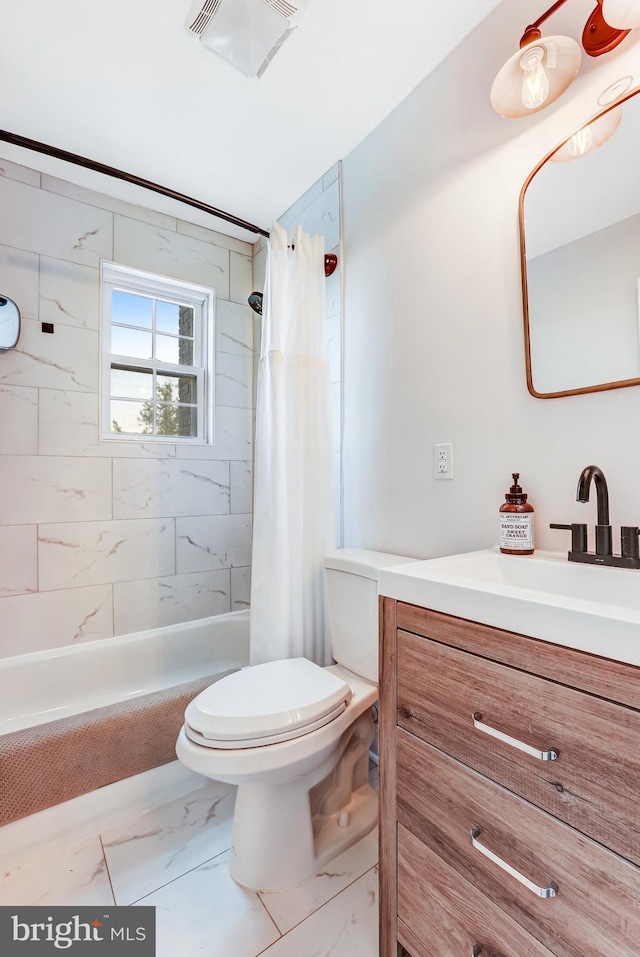5371 Chillum Pl NE, Washington, DC 20011 - full bathroom with marble finish floors, toilet, vanity, and shower / bath combo with shower curtain