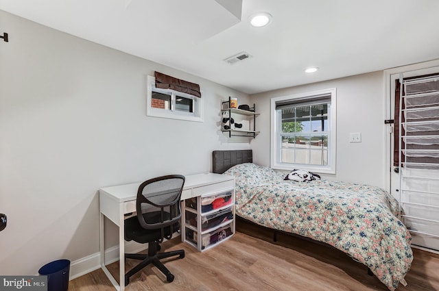 5371 Chillum Pl NE, Washington, DC 20011 - bedroom with wood finished floors, recessed lighting, a desk, and baseboards
