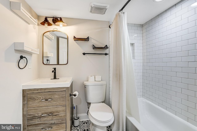 5371 Chillum Pl NE, Washington, DC 20011 - bathroom with toilet, vanity, shower / bath combo, and baseboards