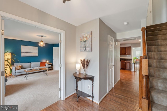 9033 Allington Manor Cir W, Frederick, MD 21703 - hallway with stairs, baseboards, visible vents, and wood finished floors