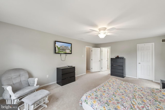 9033 Allington Manor Cir W, Frederick, MD 21703 - bedroom with baseboards, light carpet, visible vents, and a ceiling fan