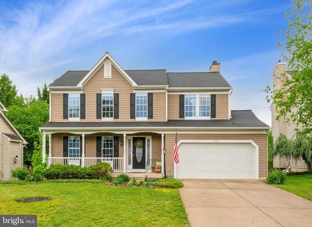 9033 Allington Manor Cir W, Frederick, MD 21703 - view of front of property with a front lawn, driveway, covered porch, and an attached garage