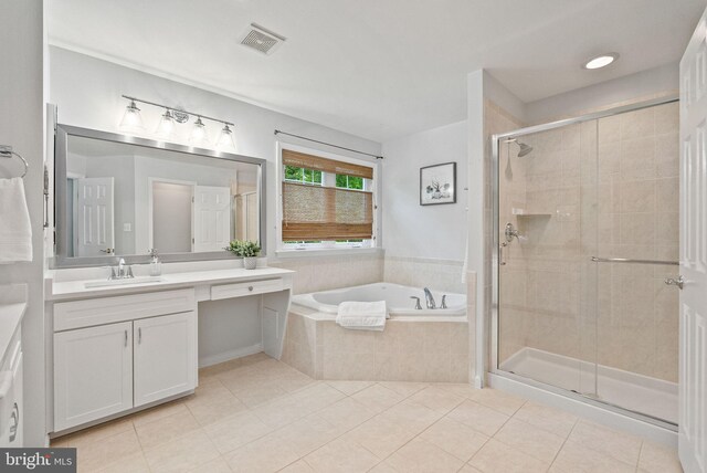 bathroom with a bath, visible vents, a shower stall, vanity, and tile patterned floors