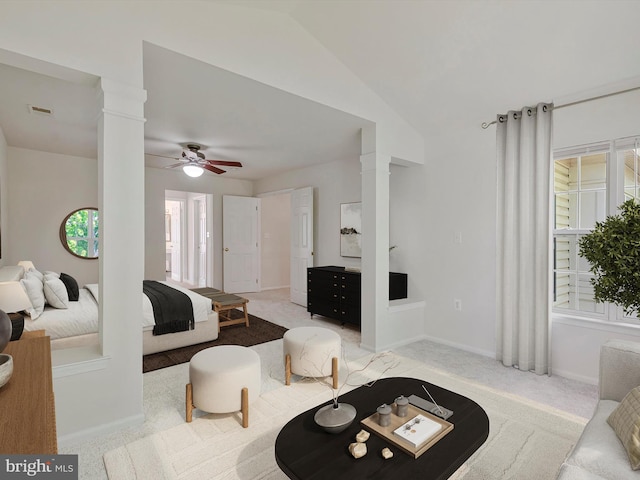 bedroom with ornate columns, light carpet, multiple windows, and visible vents