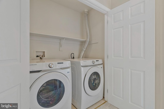 laundry area with laundry area and washing machine and dryer