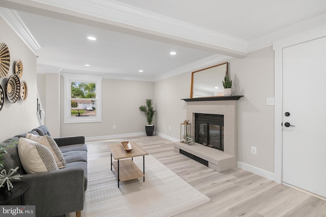 living room with recessed lighting, ornamental molding, and wood finished floors