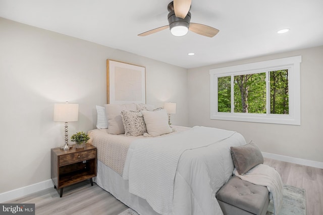 bedroom featuring recessed lighting, baseboards, and light wood finished floors