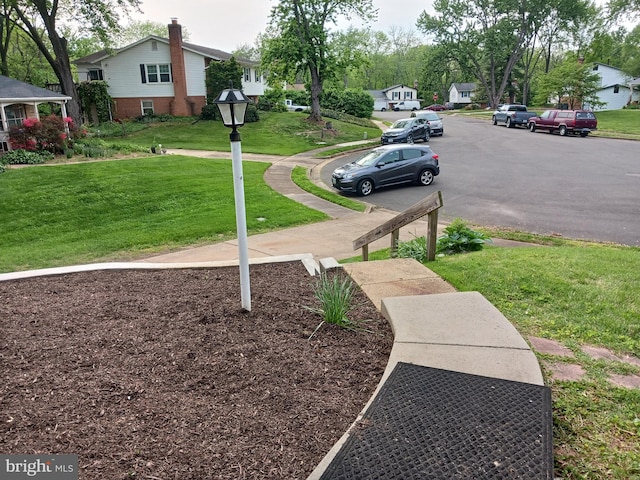 exterior space with a yard