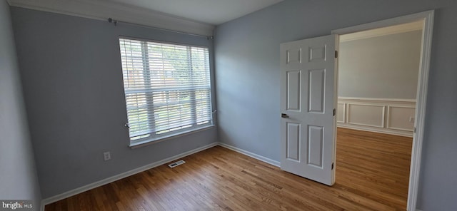 43183 Glenelder Ter, Ashburn, VA 20147 - spare room with plenty of natural light and wood finished floors