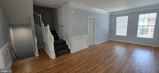 43183 Glenelder Ter, Ashburn, VA 20147 - empty room featuring stairway, wood finished floors, and crown molding