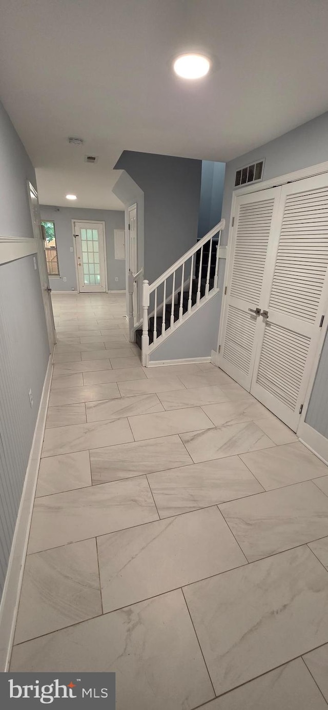 43183 Glenelder Ter, Ashburn, VA 20147 - corridor featuring stairway and light marble finish floors