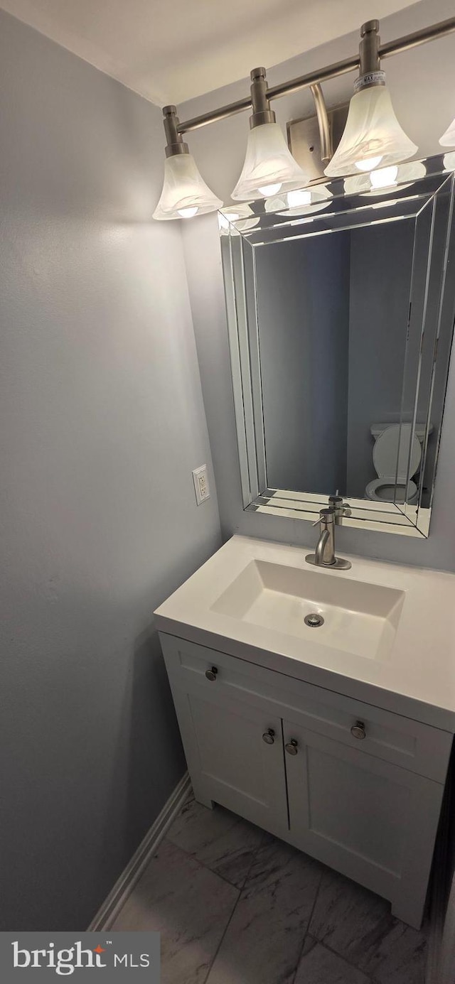 43183 Glenelder Ter, Ashburn, VA 20147 - bathroom with vanity and marble finish floors