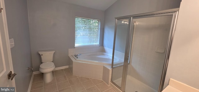 43183 Glenelder Ter, Ashburn, VA 20147 - bathroom with tile patterned floors, a bath, vaulted ceiling, and a shower stall