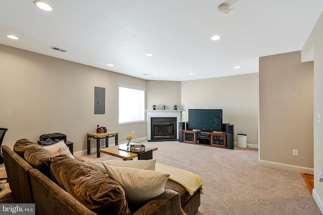 living area with visible vents, light carpet, baseboards, electric panel, and a fireplace with flush hearth
