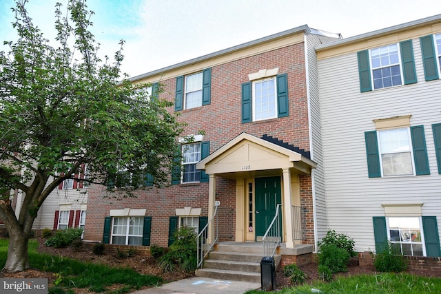 multi unit property featuring brick siding