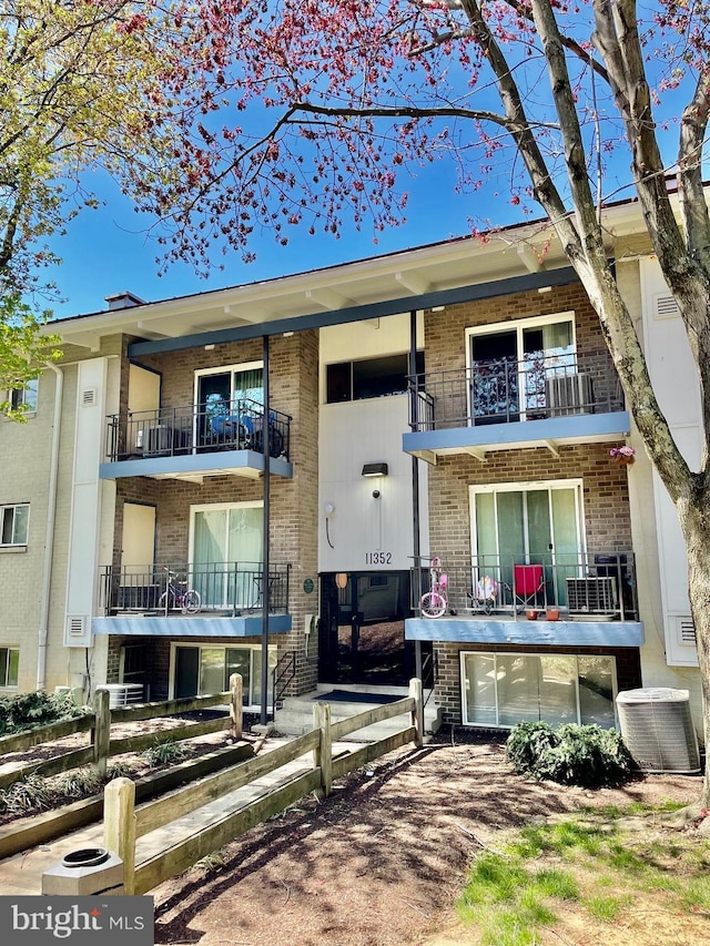 11352 Cherry Hill Rd Unit 1Y304, Beltsville, MD 20705 - view of front of home with brick siding and central AC unit