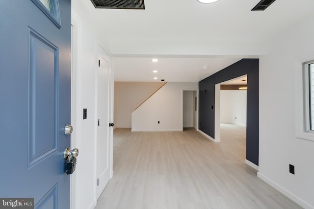 entryway featuring visible vents, recessed lighting, light wood finished floors, and baseboards