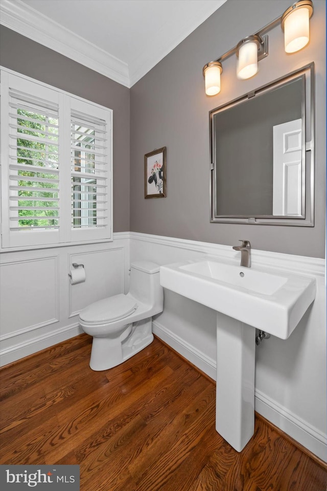 723 Ann Dr, Kennett Square, PA 19348 - bathroom featuring ornamental molding, wood finished floors, wainscoting, and toilet