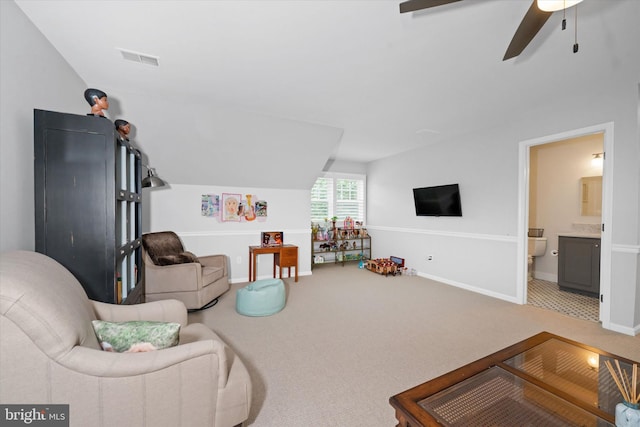 723 Ann Dr, Kennett Square, PA 19348 - carpeted living room with ceiling fan, baseboards, and lofted ceiling