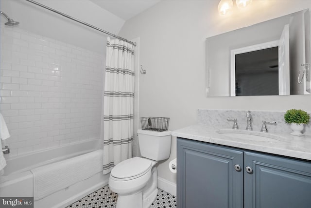 723 Ann Dr, Kennett Square, PA 19348 - bathroom featuring vanity, shower / bath combination with curtain, toilet, and baseboards