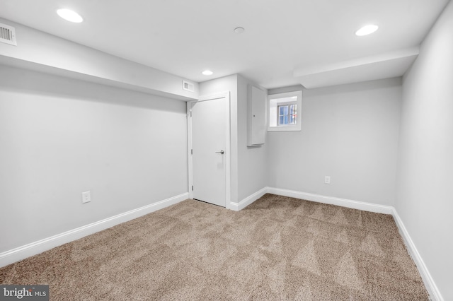 basement featuring carpet floors, recessed lighting, baseboards, and visible vents