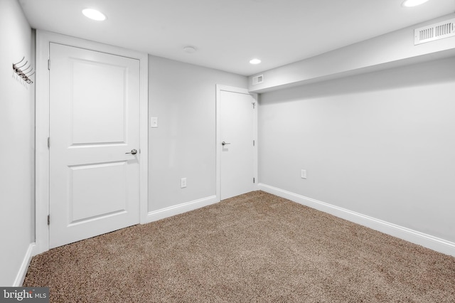 unfurnished bedroom featuring recessed lighting, carpet floors, and visible vents
