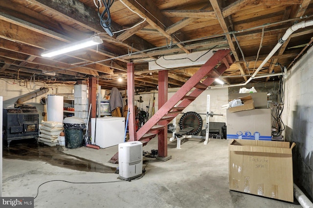 21194 Main St, Shade Gap, PA 17255 - unfinished basement with fridge and concrete block wall