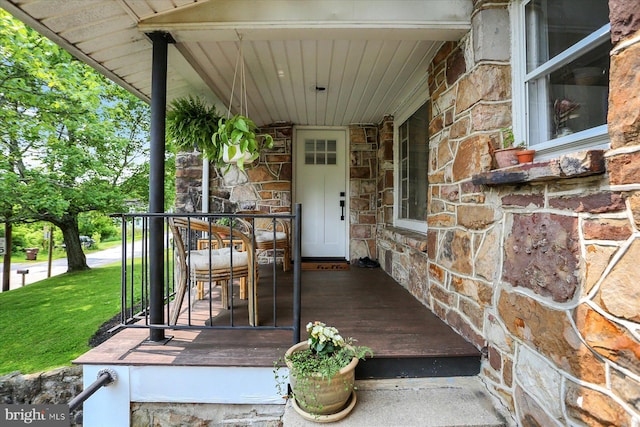21194 Main St, Shade Gap, PA 17255 - view of exterior entry with stone siding and a lawn