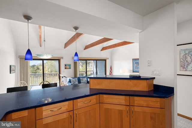 39947 Narrows Rd Unit 13, Fenwick Island, DE 19944 - kitchen featuring brown cabinets, carpet floors, open floor plan, beamed ceiling, and pendant lighting