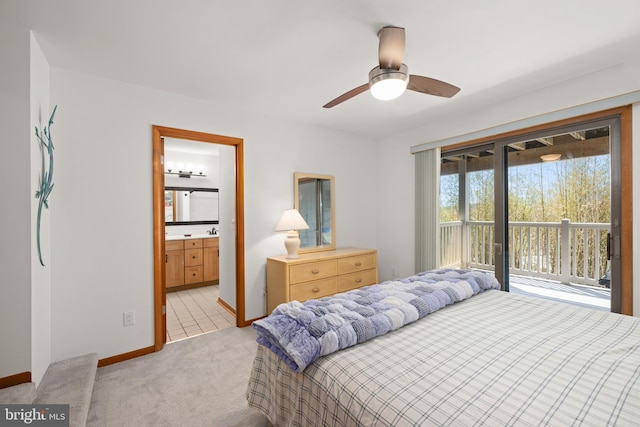 39947 Narrows Rd Unit 13, Fenwick Island, DE 19944 - carpeted bedroom with access to outside, baseboards, a ceiling fan, and ensuite bath