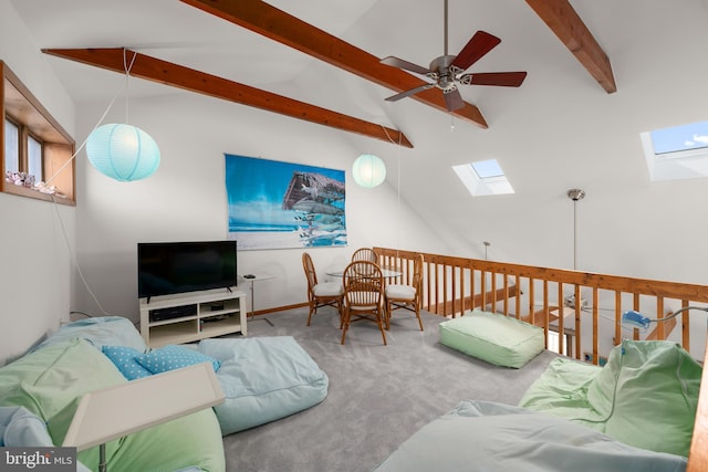 39947 Narrows Rd Unit 13, Fenwick Island, DE 19944 - living room with carpet floors, ceiling fan, and vaulted ceiling with skylight