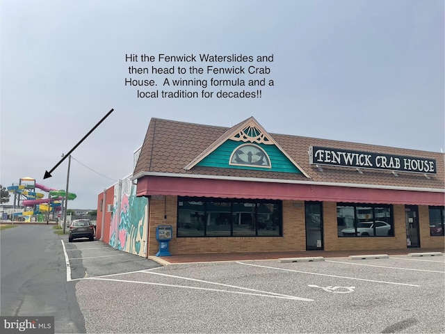39947 Narrows Rd Unit 13, Fenwick Island, DE 19944 - view of property with uncovered parking